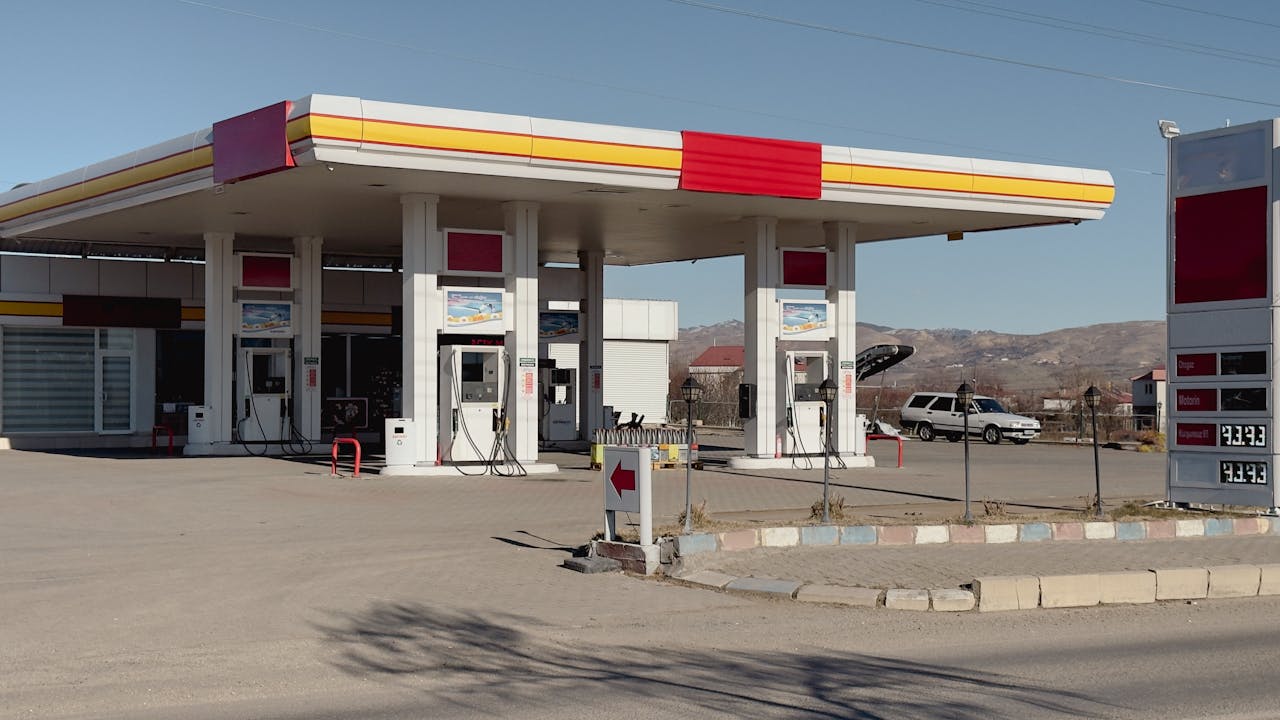 Daytime view of a petrol station in Kovancılar, Elazığ, with clear blue skies.
